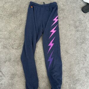 Aviator nation sweatpants lightning bolts on left leg